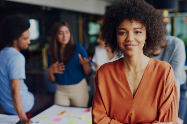 A woman with her working employees